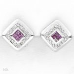 Flotte øredobber i hvitt gull med diamanter og ametyst.