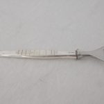 Flaskeåpner i Fasett