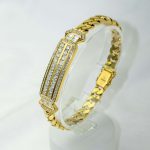 Utrolig flott armbånd i gult gull 18 k med diamanter