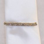 Håndlaget slipsnål med diamanter