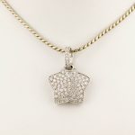 Nydelig Anhengs stjerne i hvitt gull 14 k med diamanter