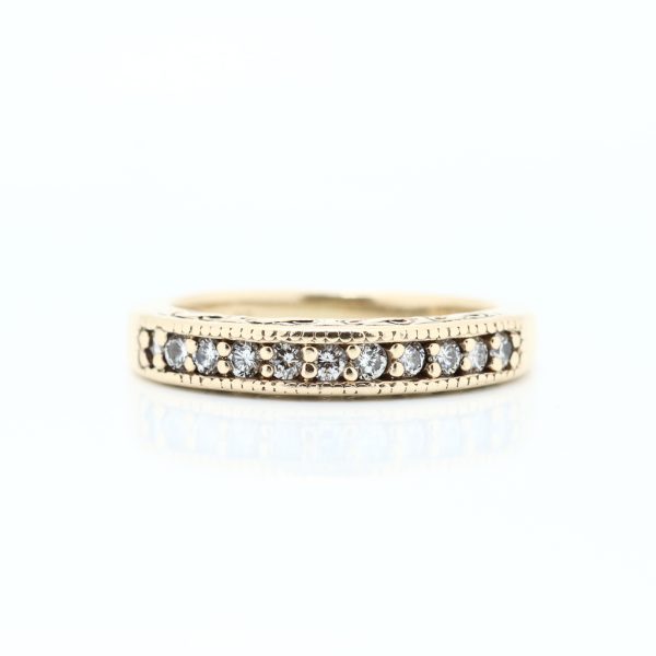 Ring i gult gull 14 k med diamanter