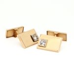 Mansjettknapper i gult gull18 k med sten