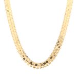 Pent mønstret halskjede i gult gull 18 k