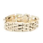 Pent mønstret armbånd i gult gull 14 k