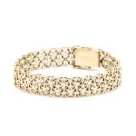 X mønstret armbånd i gult gull 14 k